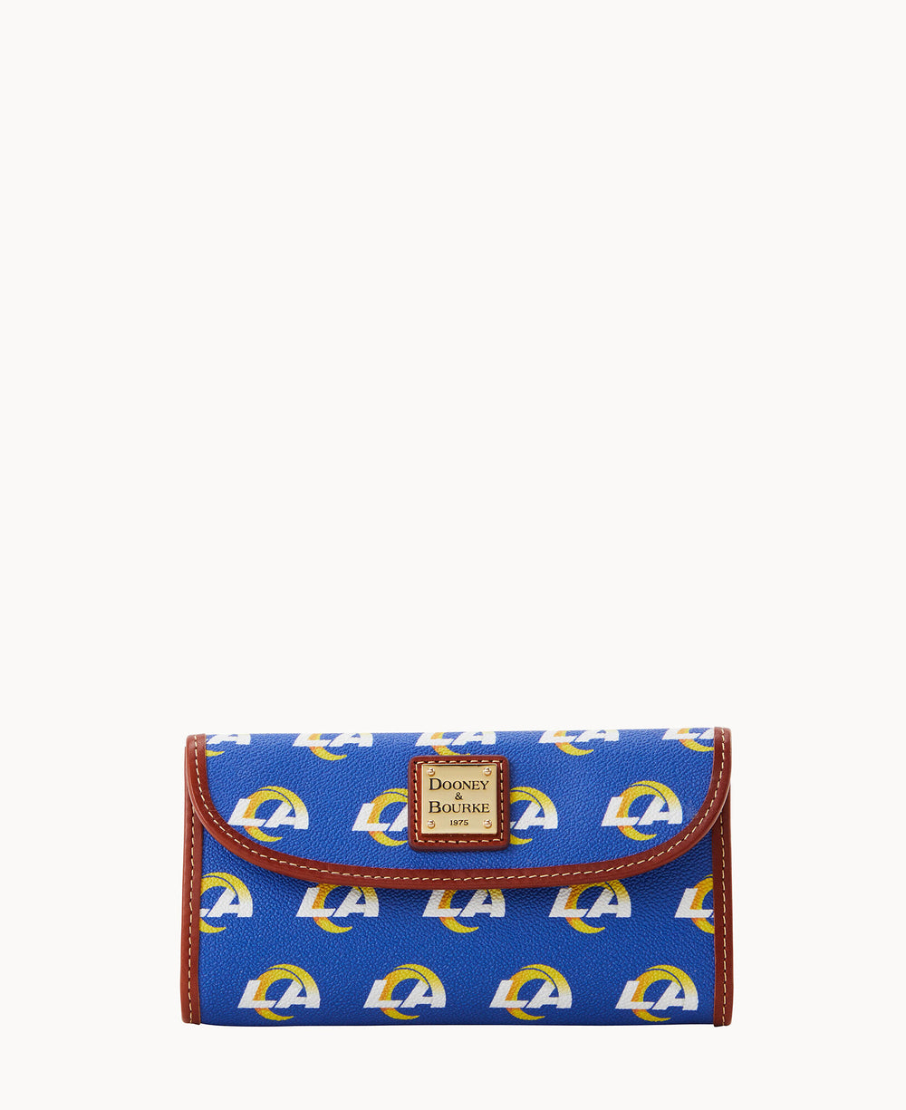Blue wallet with brown trim, decorated with repeating yellow and white Los Angeles Rams logos, and a Dooney & Bourke label on the front center. The wallet is displayed on a plain white background.