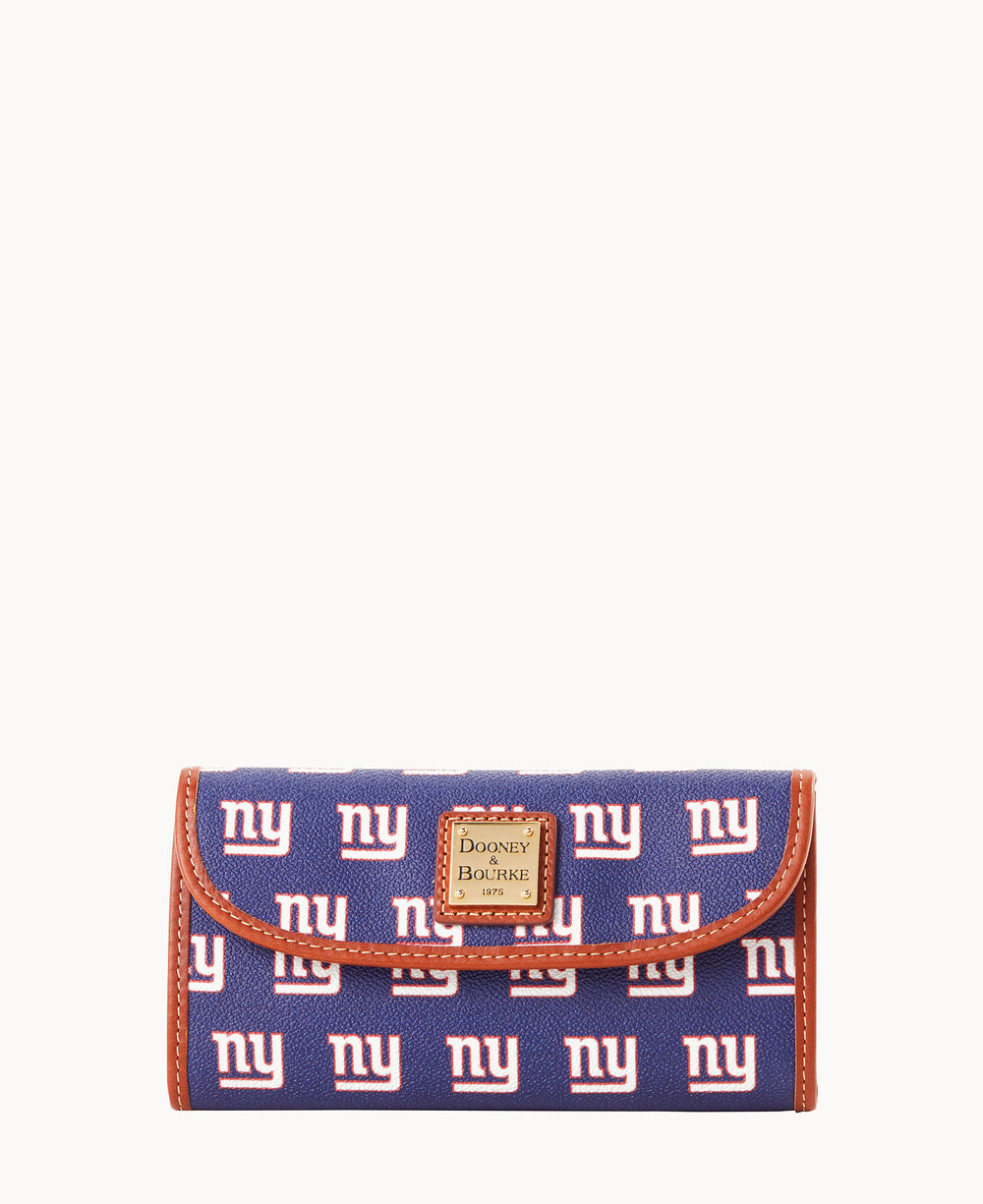 A blue wallet patterned with repeating white and red NY logos, featuring a brown trim and a gold Dooney & Bourke label on the front.