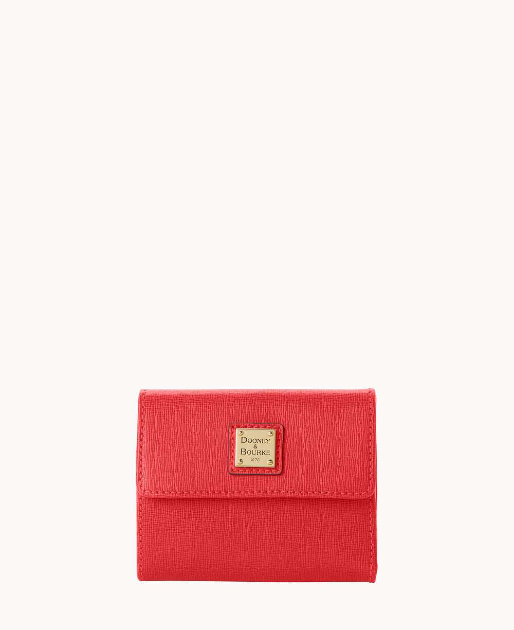 A small, textured red wallet with a flap closure and a gold rectangular Dooney & Bourke logo plate on the front, displayed against a plain white background.