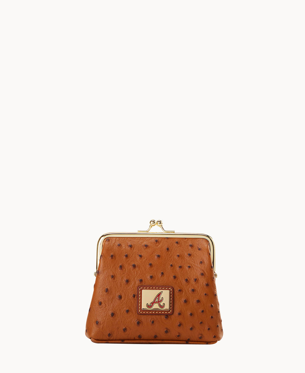 A brown, textured leather coin purse with a gold clasp and a rectangular patch displaying a red letter A on the front.