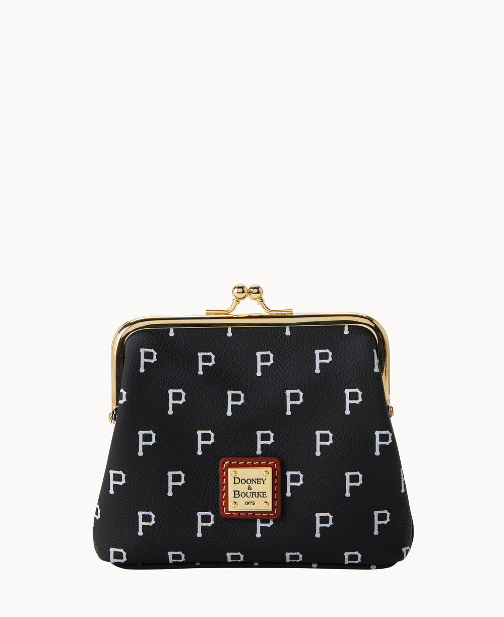 A black coin purse with a gold clasp, patterned with white letter Ps, and a brown leather patch reading Dooney & Bourke on the front.