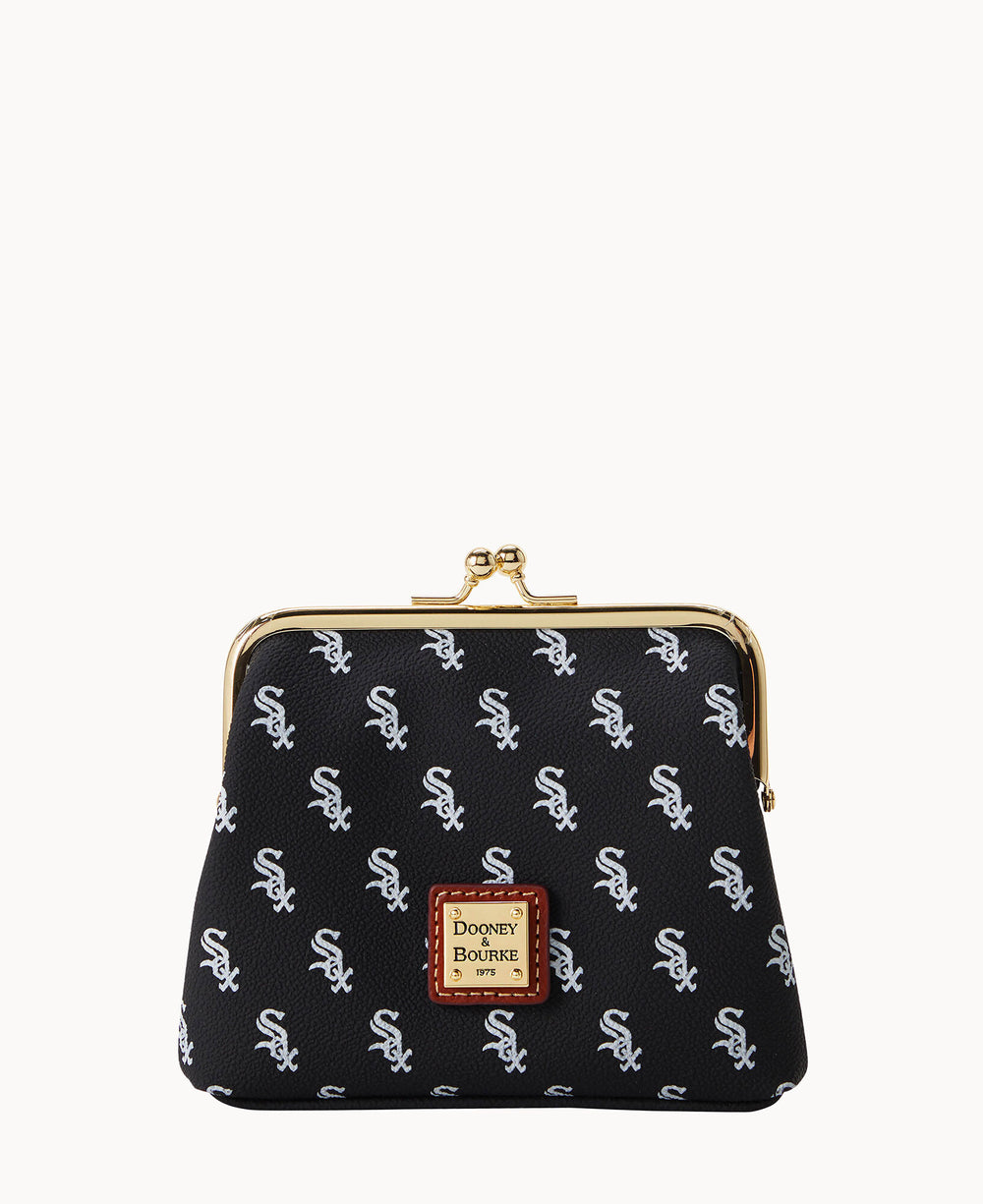 A black coin purse with a gold clasp, featuring a repeating white Chicago White Sox logo pattern and a brown Dooney & Bourke label on the front.
