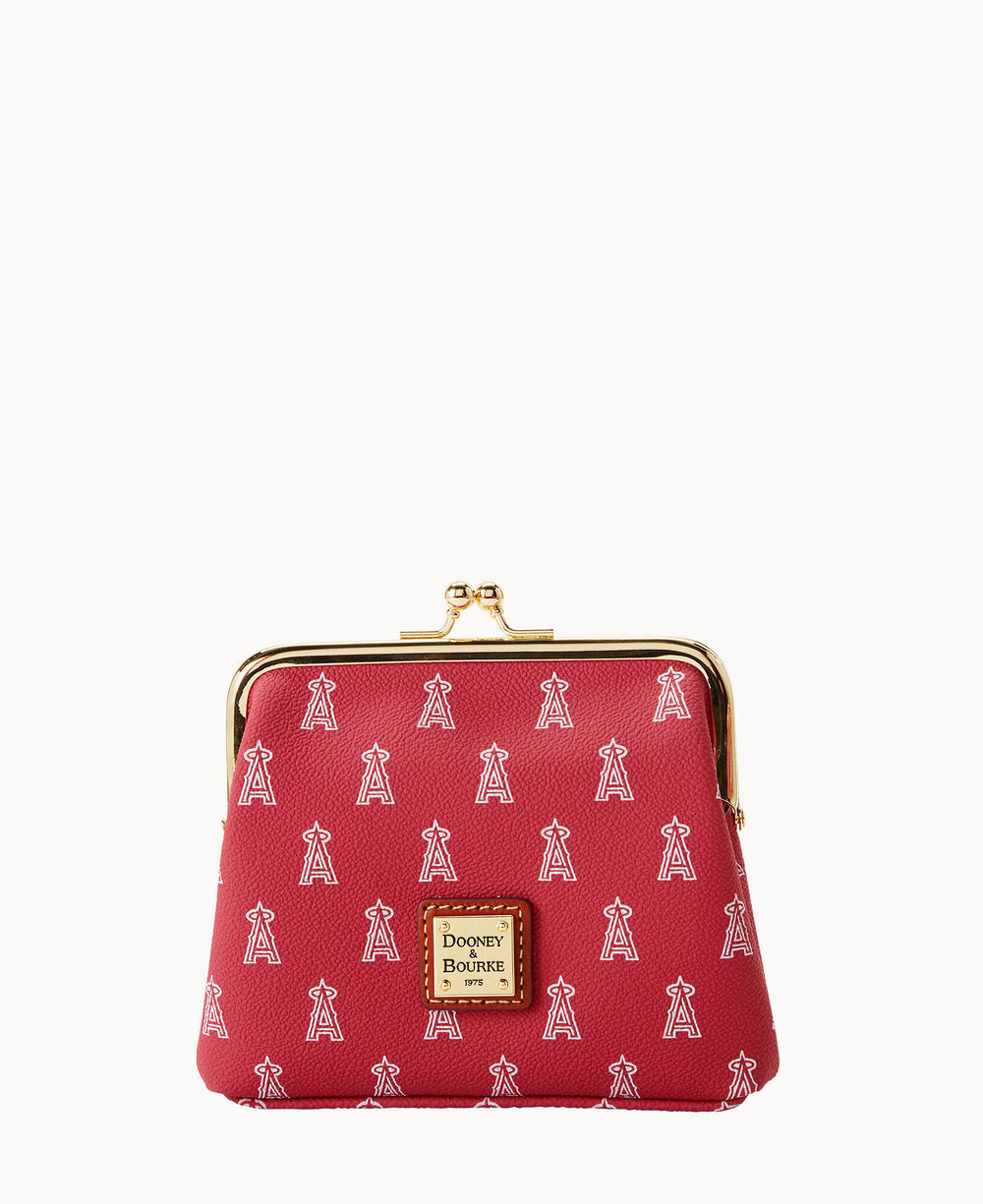 A red coin purse with a gold clasp, decorated with repeating white letter A logos. It features a gold Dooney & Bourke label on the front.