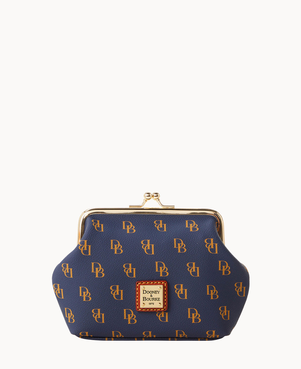 A navy blue coin purse with a gold clasp, decorated with a repeating gold DB monogram and a Dooney & Bourke logo patch on the front.