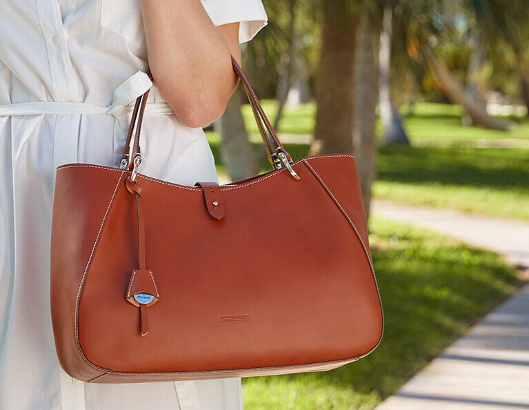 Buy the Dooney and Bourke Women's Tan Leather Purse