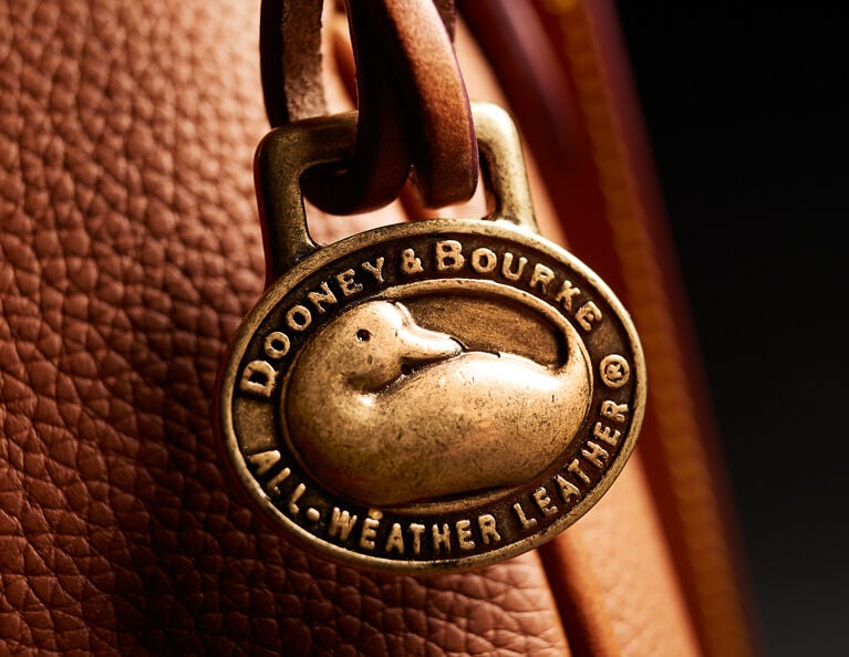 Dooney Bourke Pebble Grain Logo Lock Bag | lupon.gov.ph