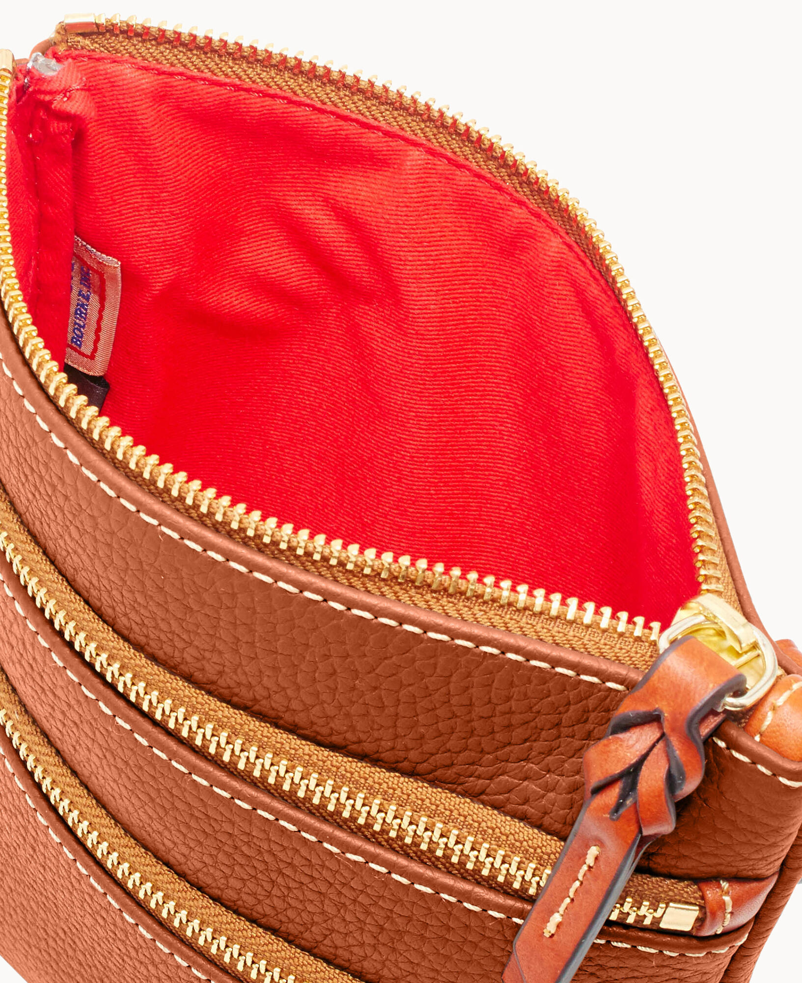 Dooney and bourke 3 zipper crossbody hot sale