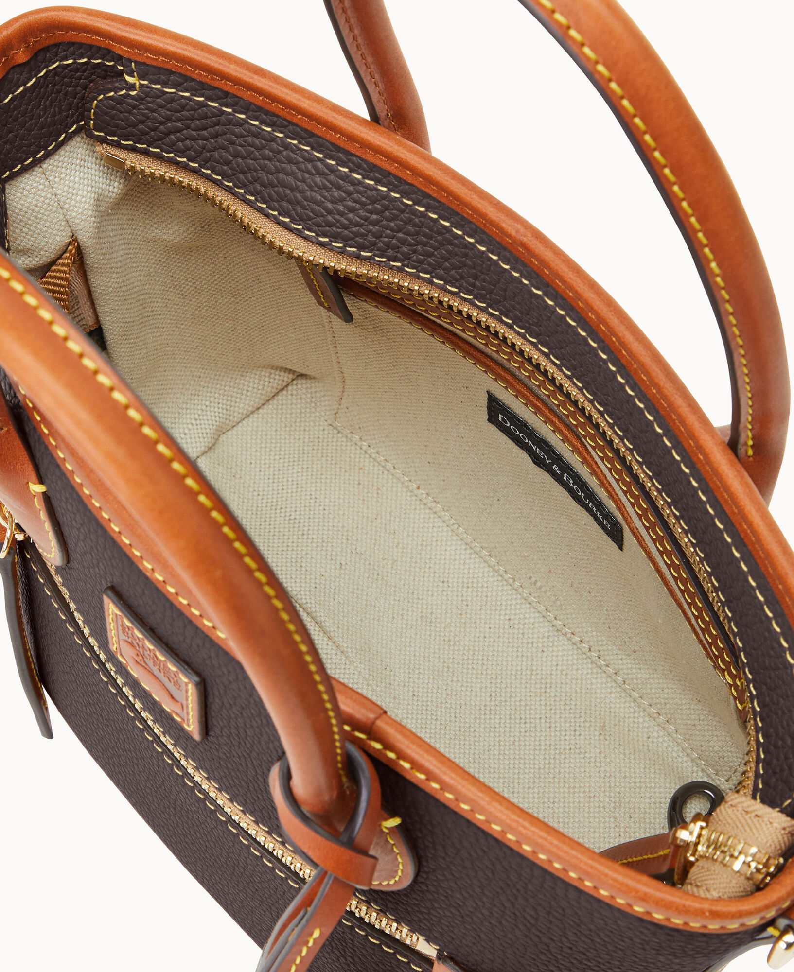 How to clean dooney and bourke pebble leather 2025