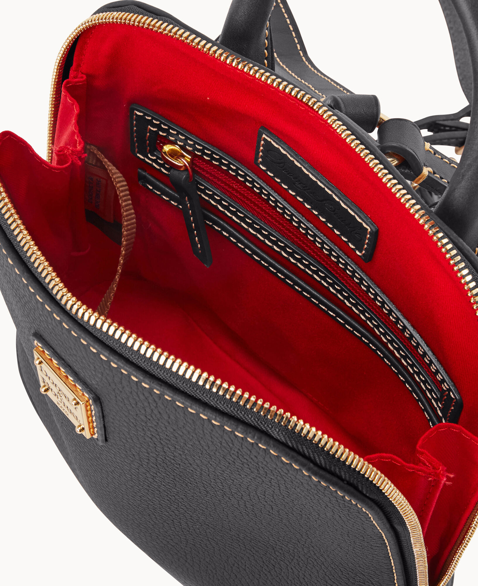 Dooney & bourke pebble grain zip pod backpack hot sale