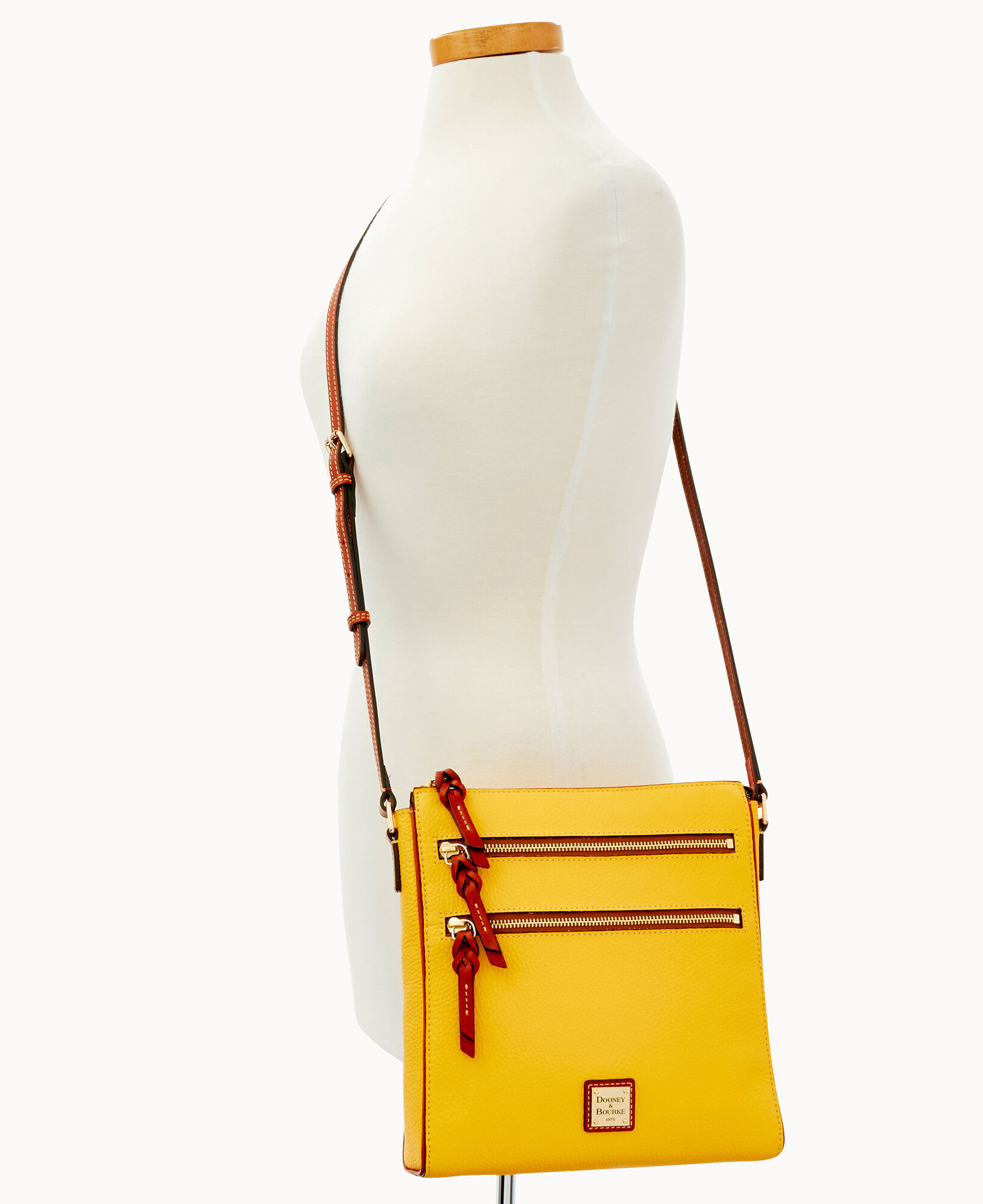 Dooney & bourke pebble top leather triple zip crossbody handbag