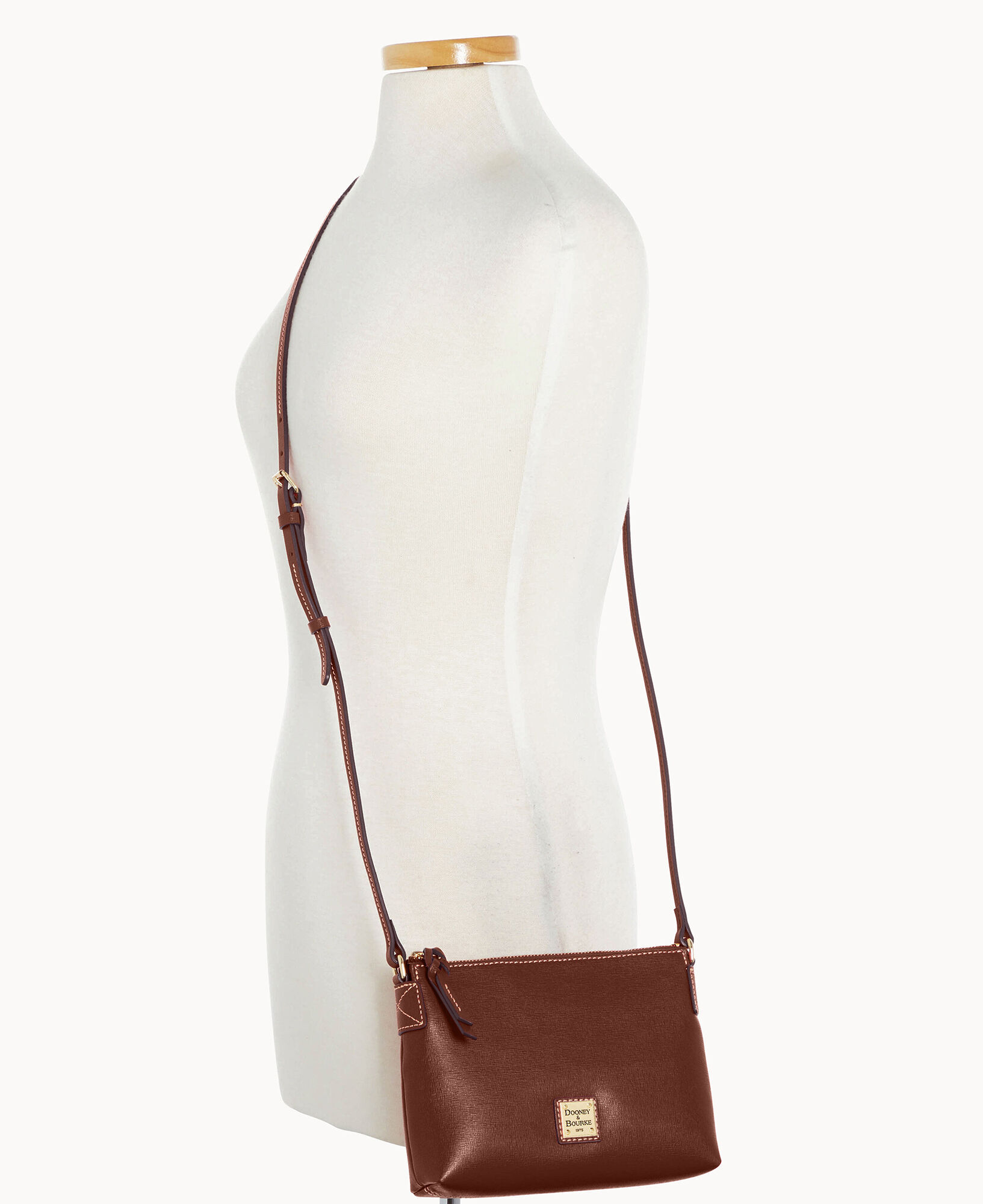 Dooney bourke pouchette crossbody bag hot sale