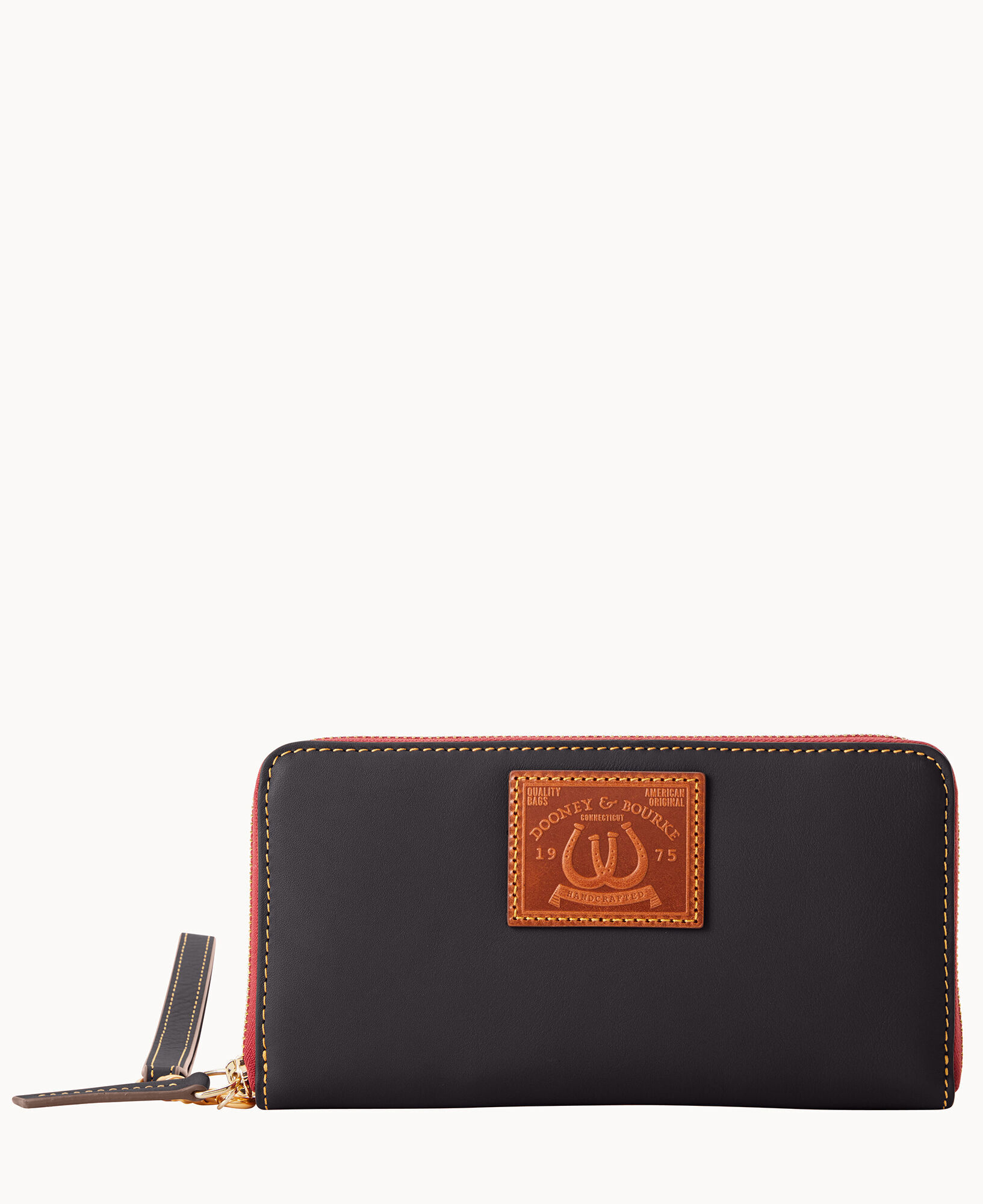 Dooney and bourke large zip around wristlet sales