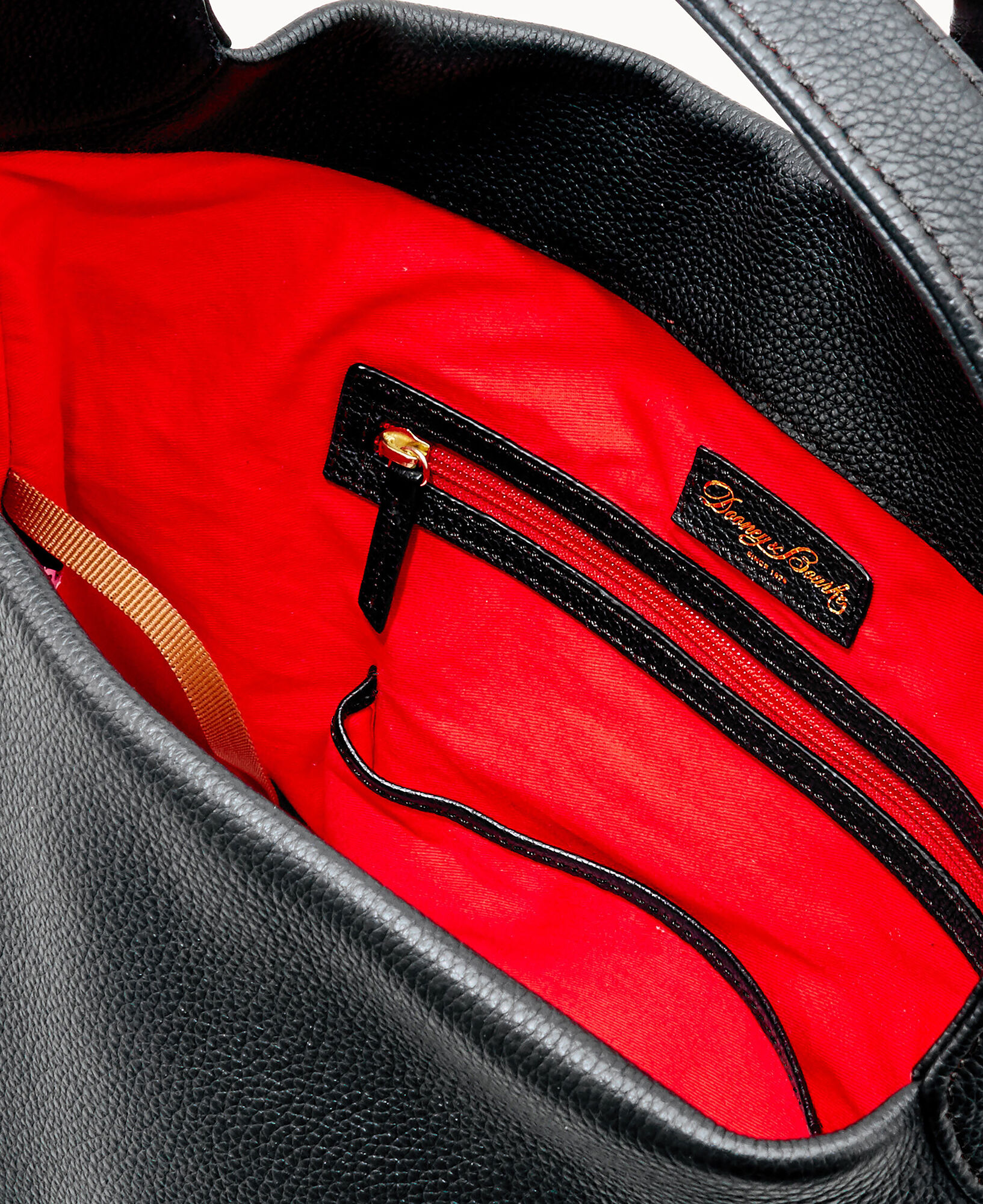 Dooney and bourke black purse with red best sale interior