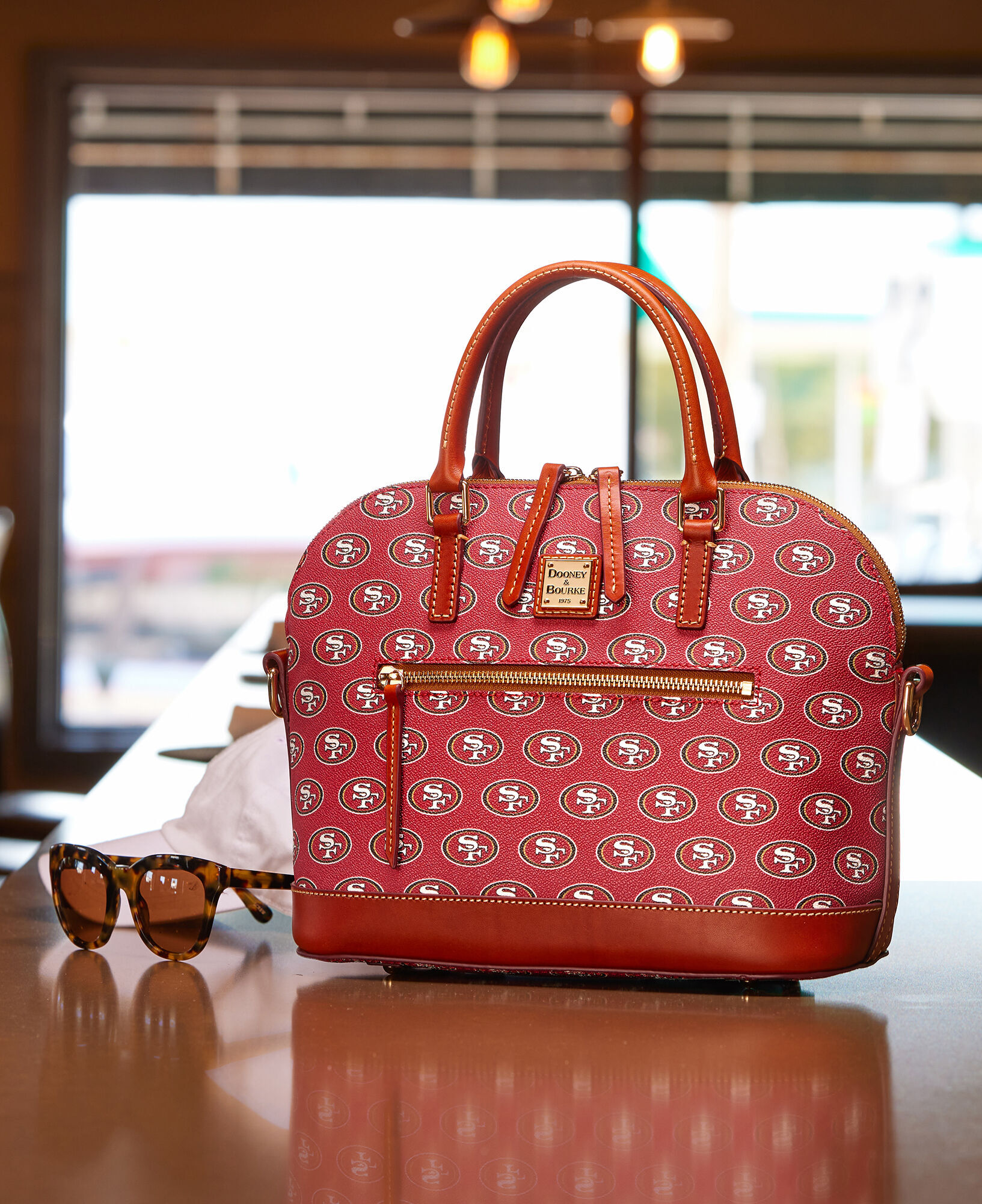Dooney and bourke nfl clearance