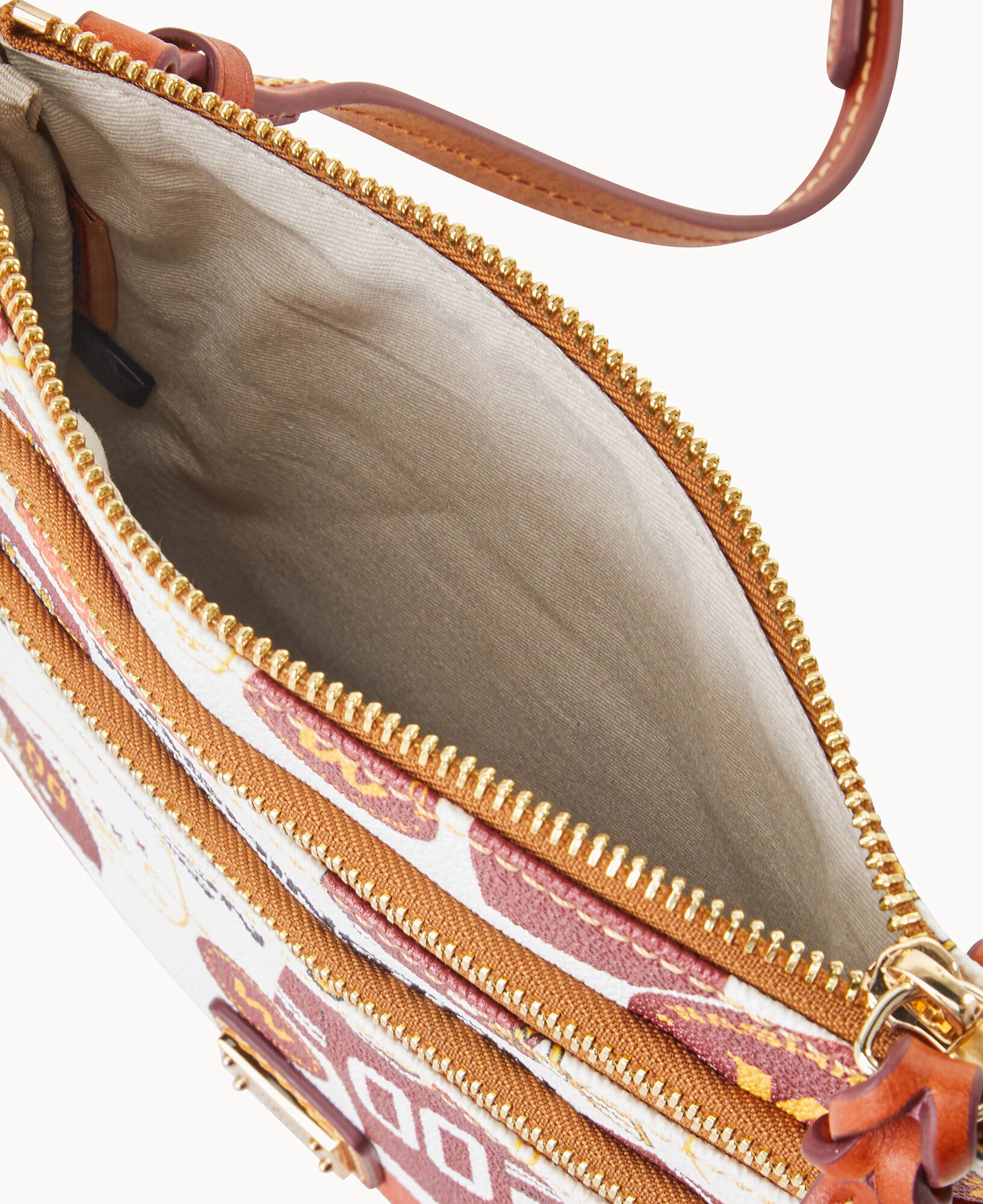 Dooney & bourke pebble top leather triple zip crossbody handbag