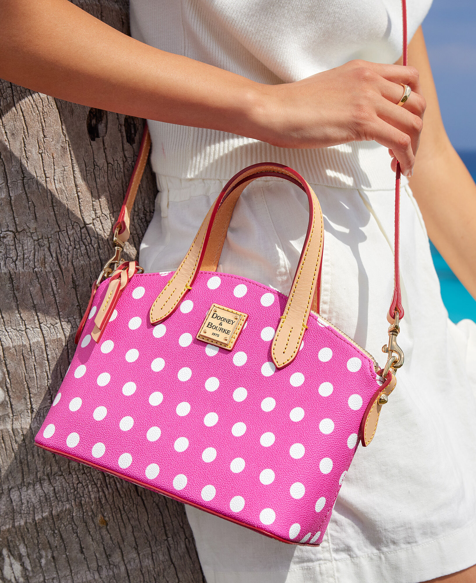 Dooney and bourke polka dot wallet clearance