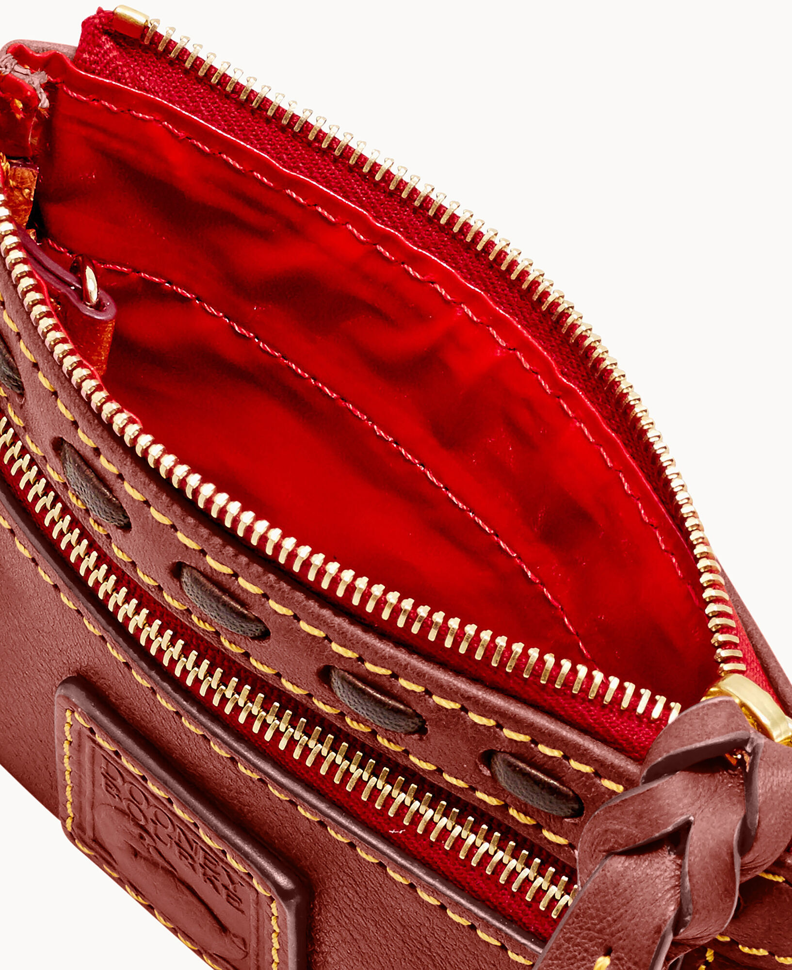 Dooney and bourke florentine coin purse 2025