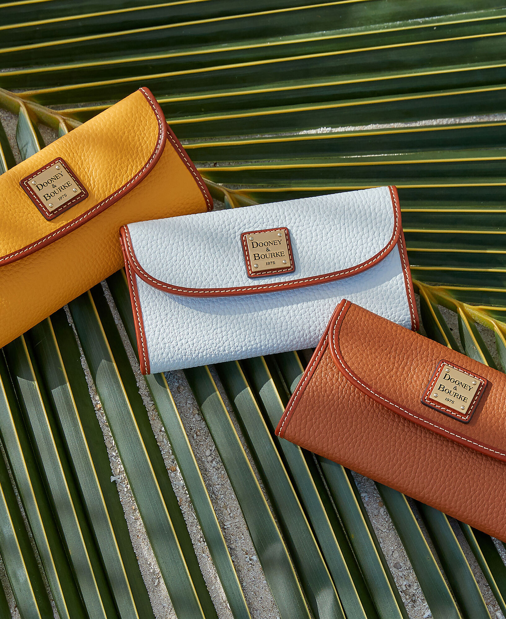 Dooney Bourke Pebble Grain Continental Clutch