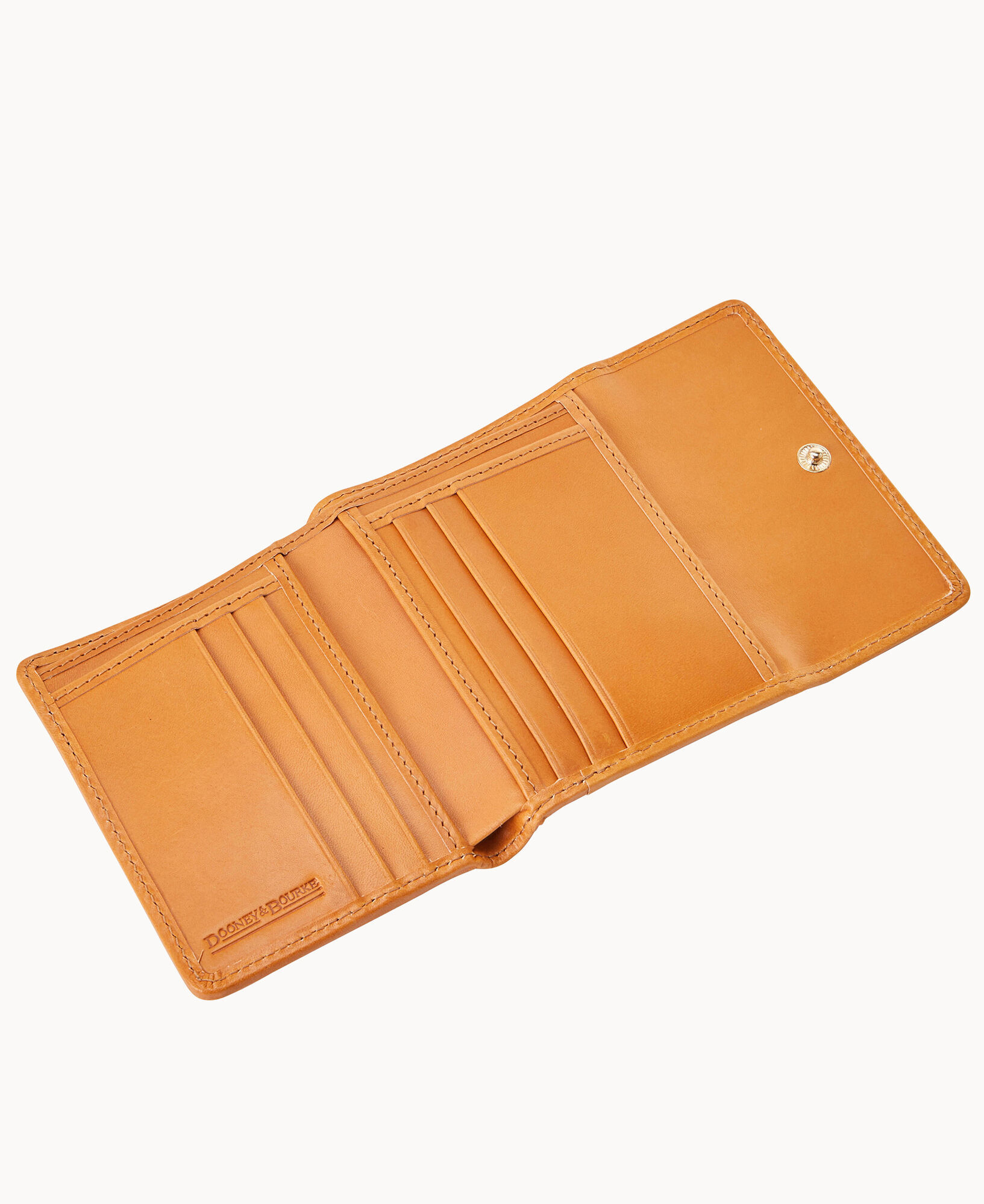 Dooney & bourke best sale vachetta leather flap wallet