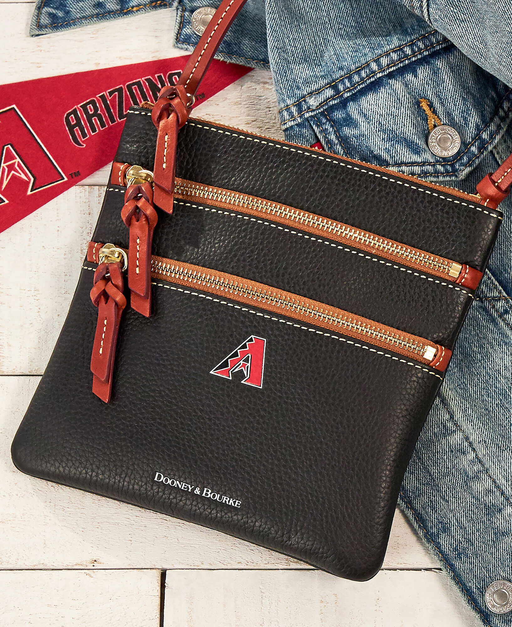 Dooney and bourke triple zip crossbody store